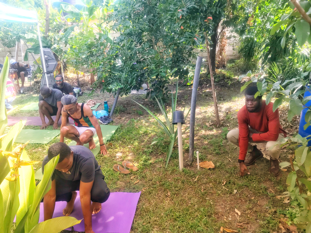 patrons-doing-yoga-word-sound-healing-mind-being-wellness-tami-tsansai-mens-mental-health-jamaica