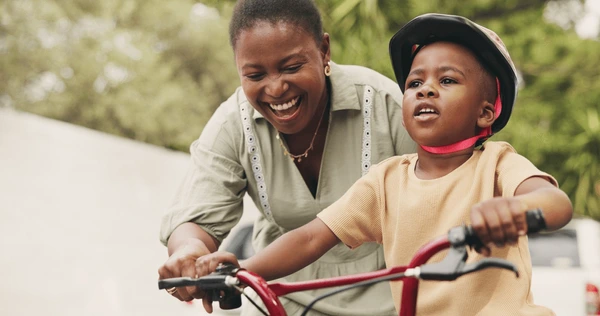 support-teaching-boy-on-bicycle-600nw-2638386303